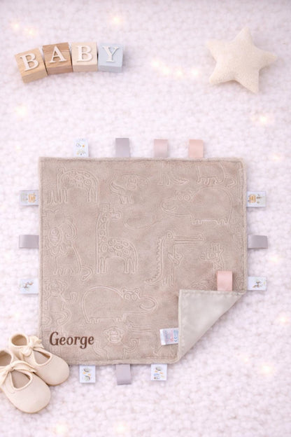 Personalised Baby Taggie with Embroidered Baby Name.