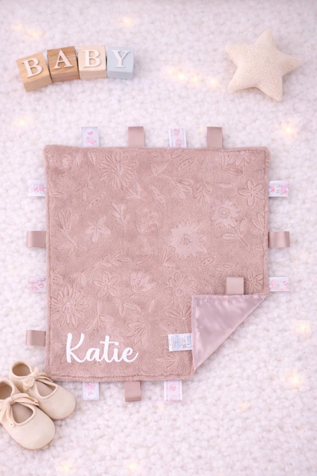 Personalised Baby Taggie with Embroidered Baby Name.