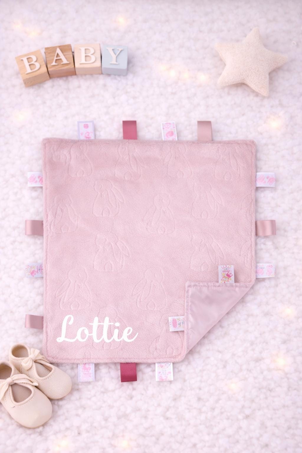 Personalised Baby Taggie with Embroidered Baby Name.