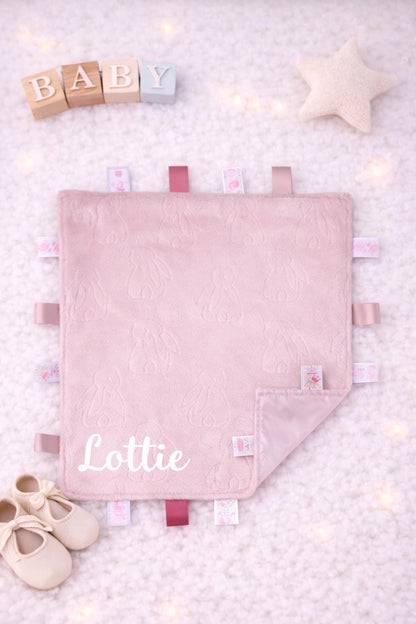 Personalised Baby Taggie with Embroidered Baby Name.